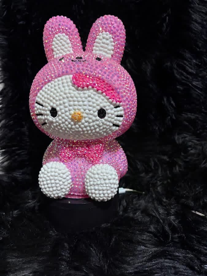 Pink bunny character covered in rhinestones